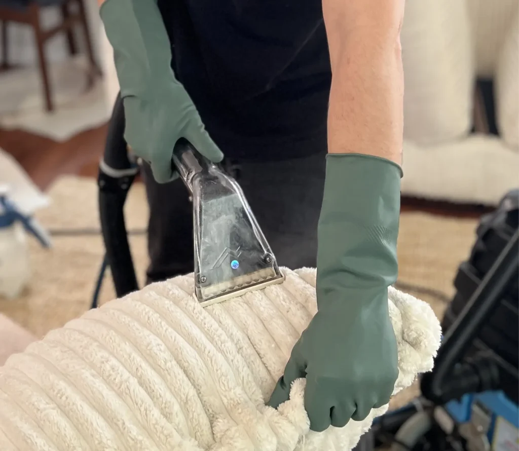 Deep upholstery cleaning using extraction method to remove stains and residue