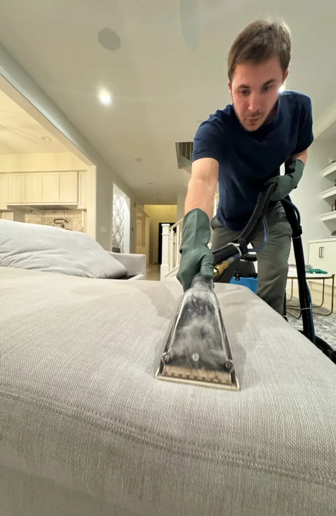 Deep couch cleaning in Dallas extracting dirt and odors from fabric upholstery