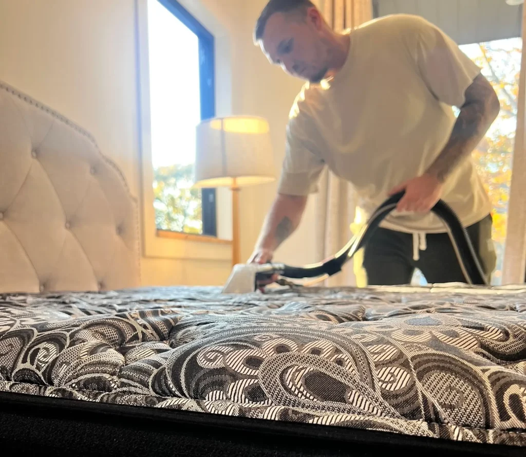 Deep mattress cleaning in Dallas removing stains, dust, and allergens from fabric surface